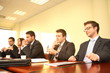 five business persons at a conference,interview