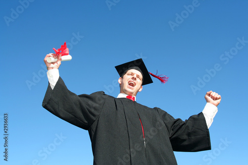 happy young man at graduation