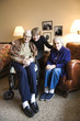 Middle-aged daughter with elderly mom and dad