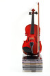 violin standing upright on stack of compact discs