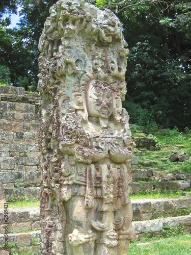 maya deus stone statue with some coloured paint, copan, honduras
