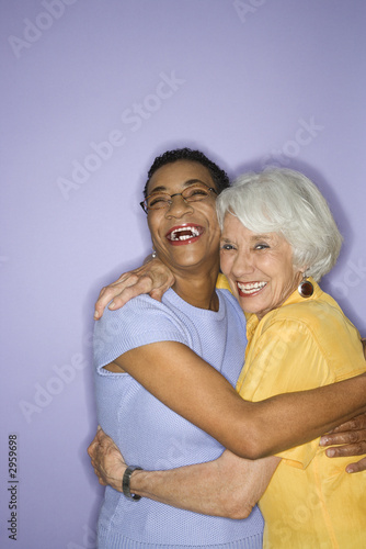 Photo: women embracing. women embracing.