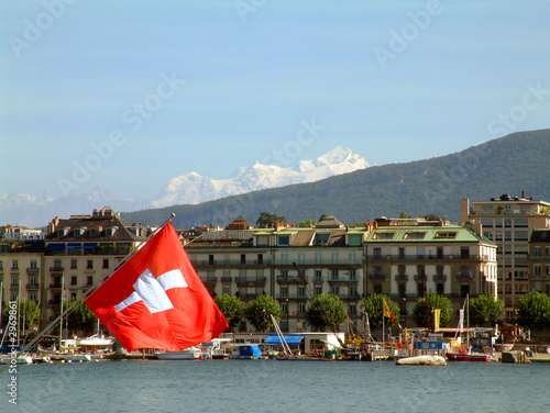 geneva switzerland with mont blanc and swiss flag