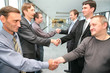 shaking hands business partners