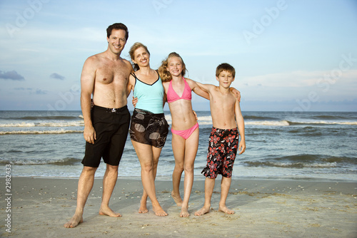 Portrait of family at beach.