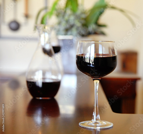 Photo: wineglass on bar. wineglass on bar.