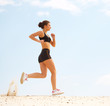the girl runs on sand