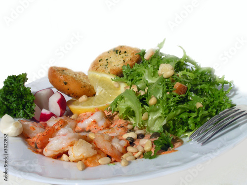 prawns with delicious salad and sauce of wine