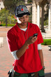 young man standing outside