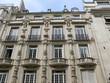 façade d'immeuble, balcons de pierre. façade d'immeuble, balcons de pierre.