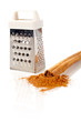 sticks, powder of cinnamon and grater