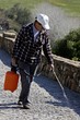 Photographie : worker spraying the ground with insecticide
