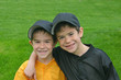 brothers in baseball uniforms