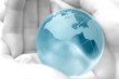 hand holding globe hand holding globe