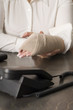 businesswomans injured hand