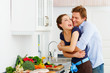 young couple in their kitchen