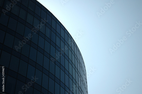 modern building fades into blue sky modern building fades into blue sky
