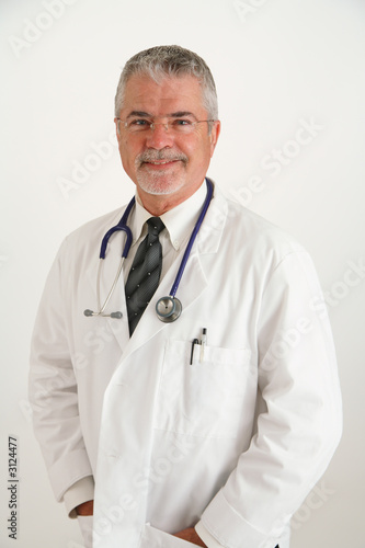 Foto: happy confident smiling doctor hands in pocket happy confident smiling doctor hands in pocket