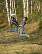 jumping loving young couple