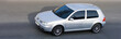 isolated silver german coupe drive high speed
