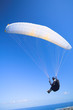paraglider launching from the mountain ridge