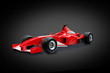 red formula one car in black background red formula one car in black background