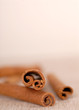 several cinnamon sticks with a very shallow depth of field