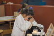 child with microscope
