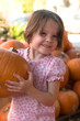 Photo: little girl with pumpkin little girl with pumpkin