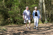 senior couple strolling through the park