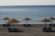 empty beach with sun shades