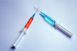 orange and blue syringes 2