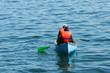 orange green blue canoe