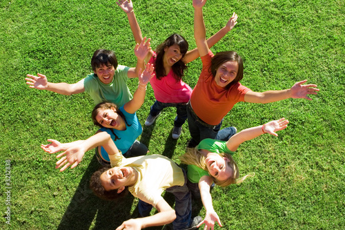 group of happy smiling teenagers