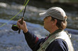 fisher in river