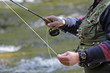 fisher in river