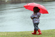 little girl in the rain