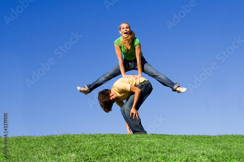 Photo: leapfrog, happy smiling youth leapfrog, happy smiling youth