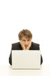 businessman uses laptop