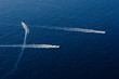 three speedy motor boat in the ocean