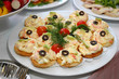 some appetizing food on a banquet table some appetizing food on a banquet table