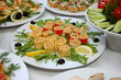some appetizing food on a banquet table some appetizing food on a banquet table
