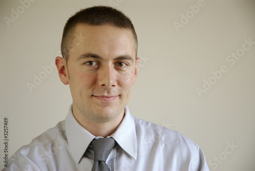 Photo: smiling businessman smiling businessman