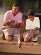 boy and grandfather fishing