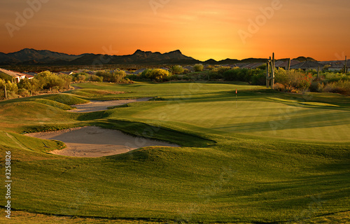Photo: golf course at sunset golf course at sunset