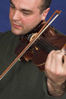 portrait of man playing violon portrait of man playing violon