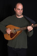 portrait of man playing guitare portrait of man playing guitare