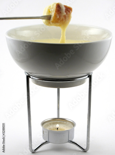 Photo: cheese fondue in pot cheese fondue in pot