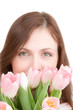 woman portrait with bouquet of tulips