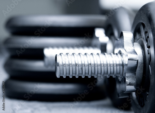 dumbbells on grey